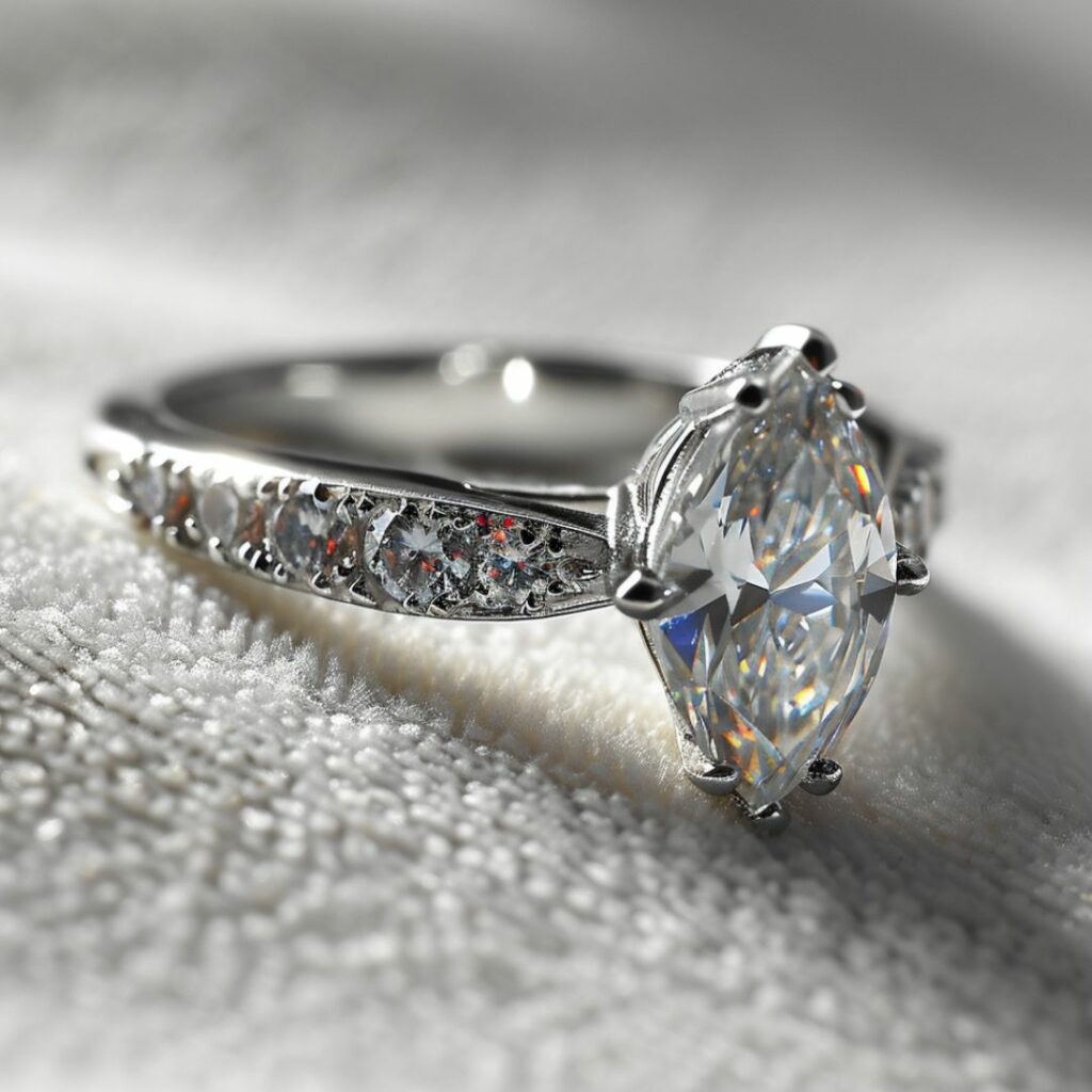 Marquise Cut Diamond Engagement Ring with Pave Set Accents in a White Gold Band